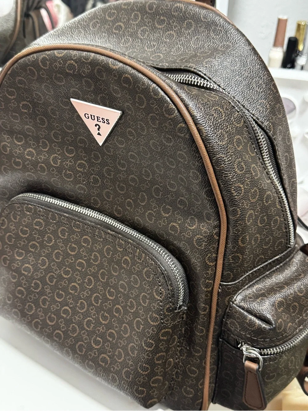 GUESS Brown Monogram Mini Backpack with Silver Logo